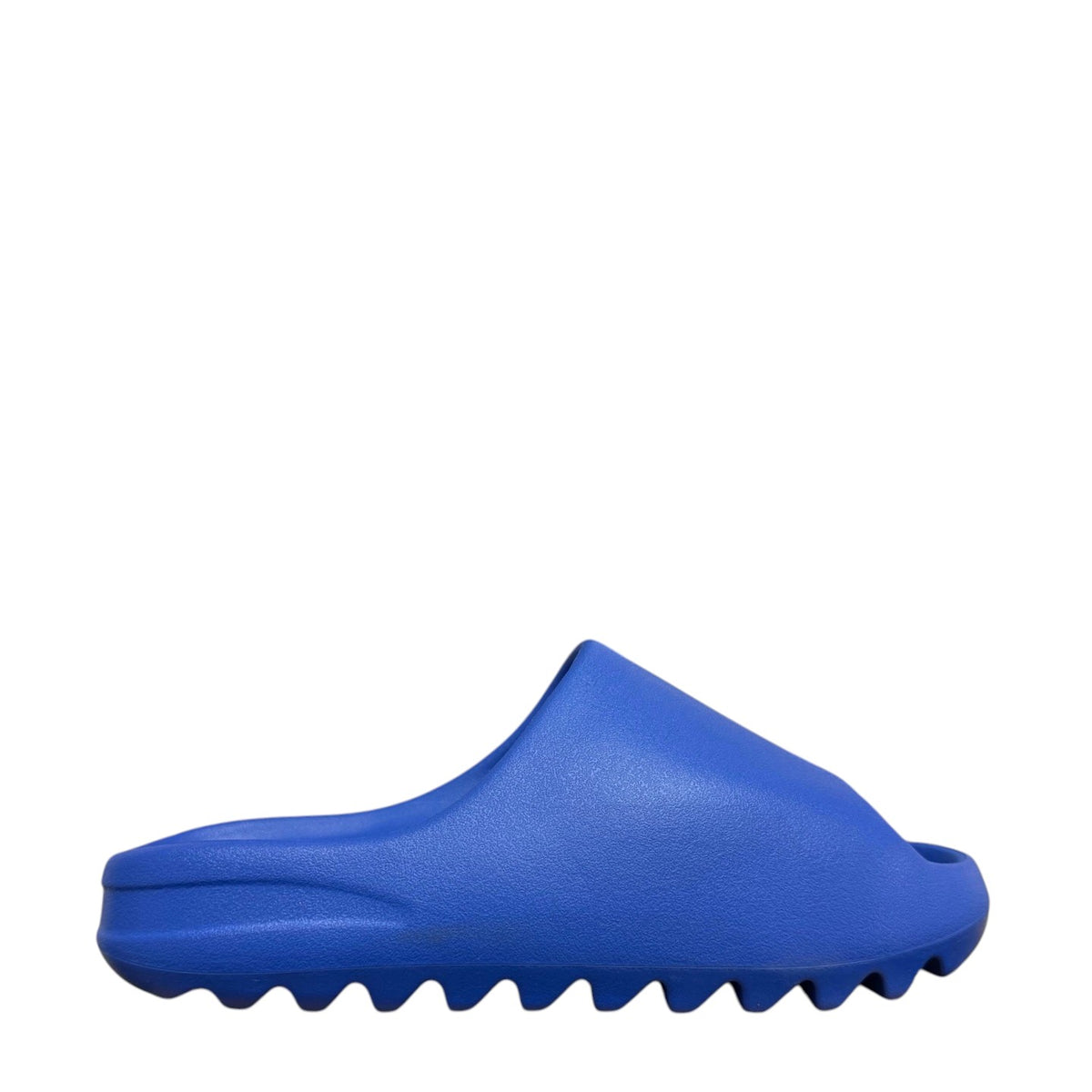 Luxury Chef YEEZY SLIDE in bright blue, featuring a comfortable, slip-on design with a contoured footbed and textured sole.