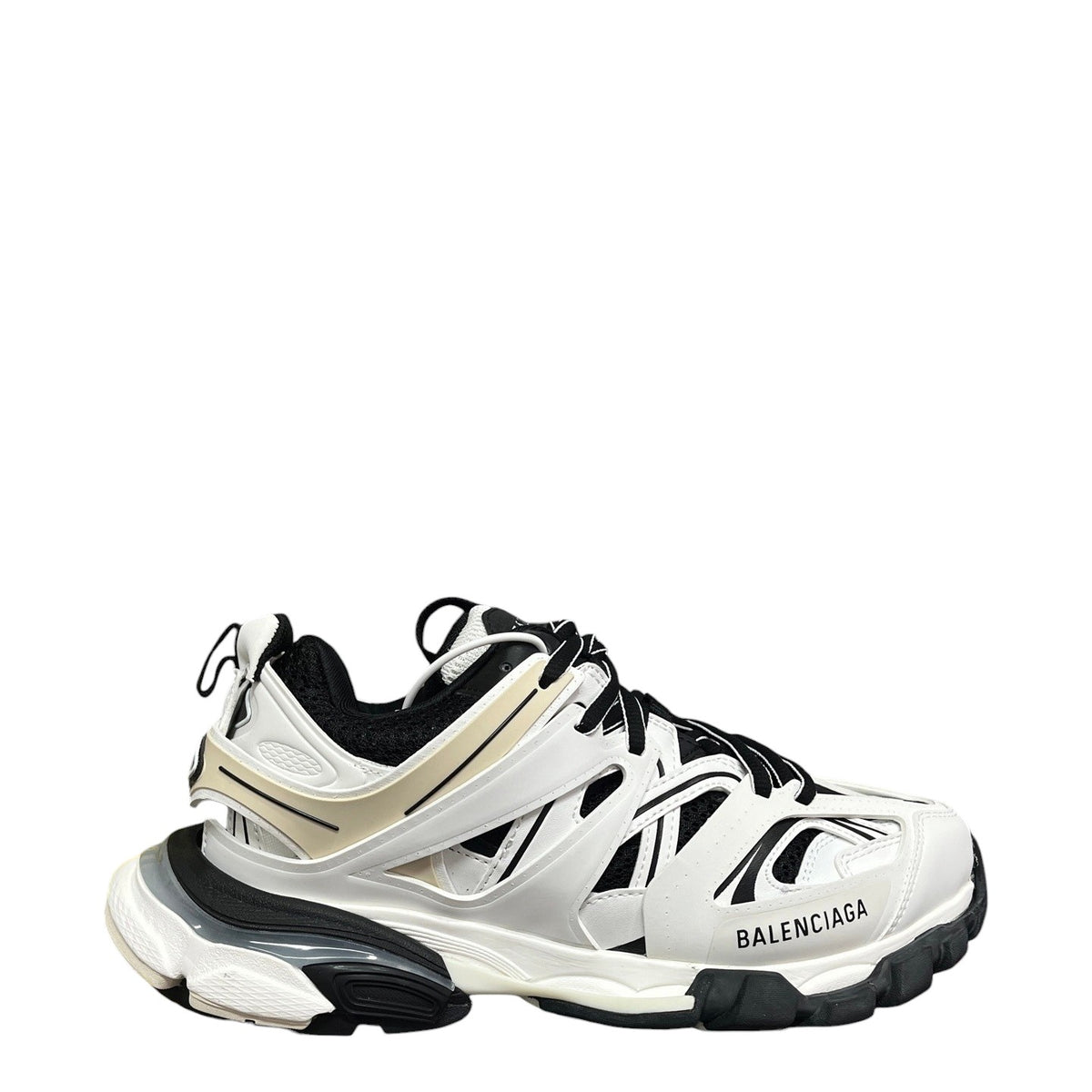 Luxury Chef Balenciaga Track sneakers in white, black, and beige with a chunky sole and breathable mesh panels.