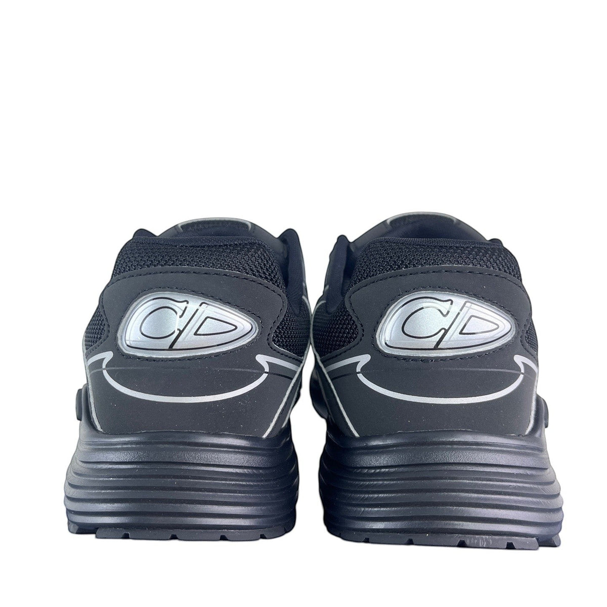Luxury Chef black mesh and leather DIOR B30 sneakers with silver CD logo detail and white trim.