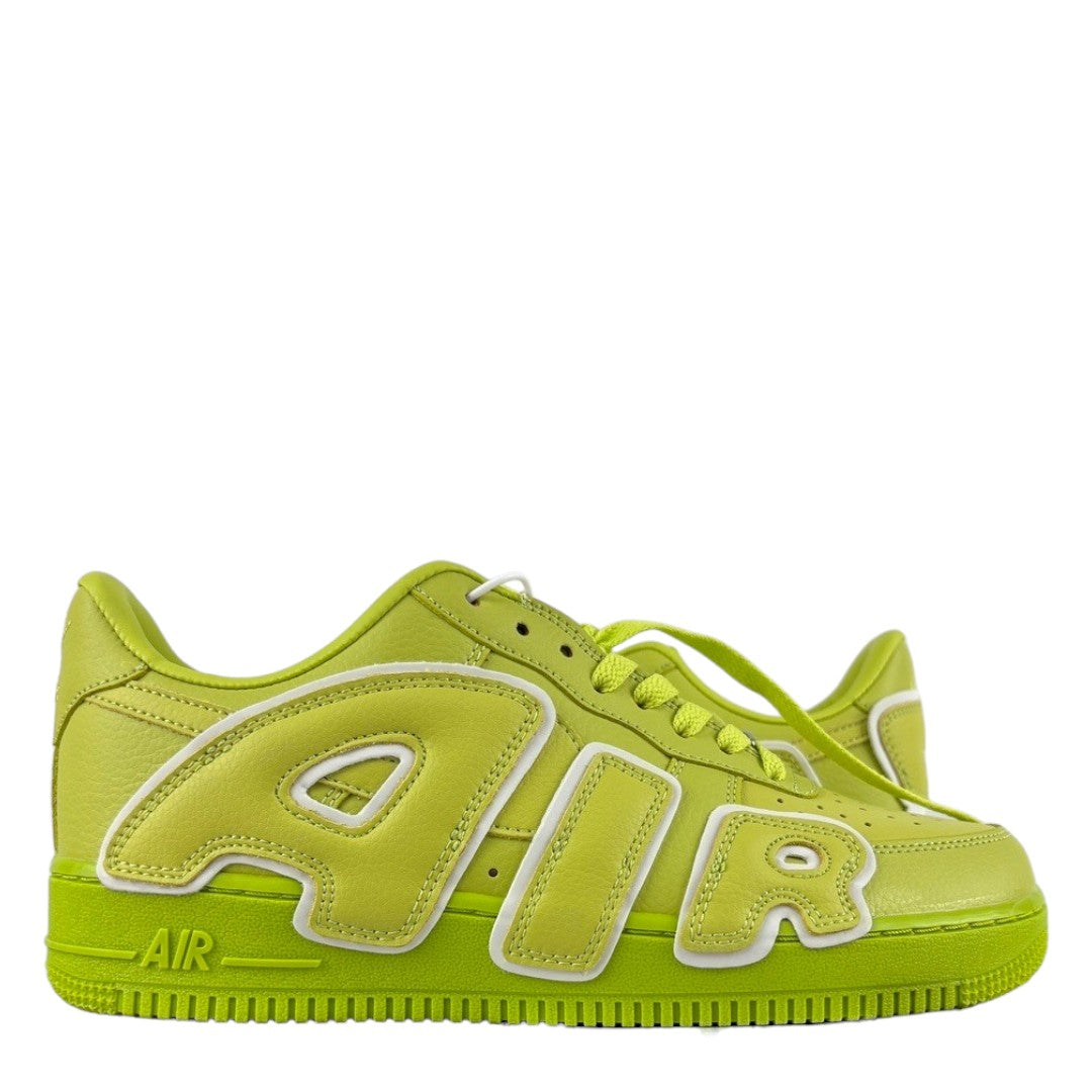 Luxury Chef yellow leather Nike Air Force 1 CPFM sneakers with white trim and large AIR lettering.